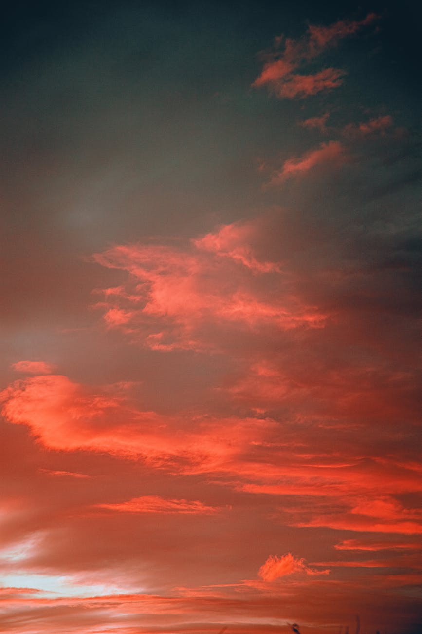 red clouds in a grey sky