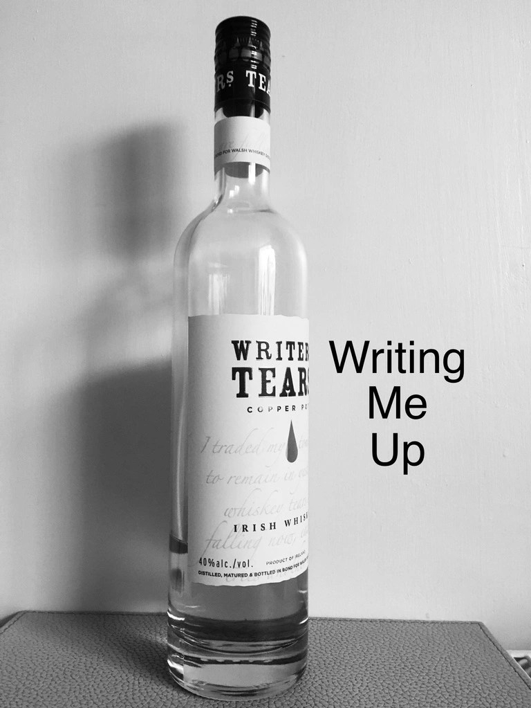 a bottle of whisky labelled writers tears