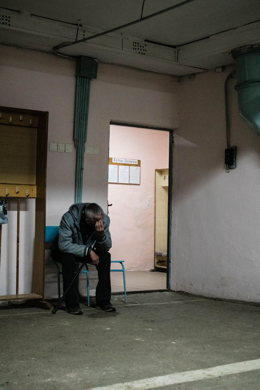 man hiding in bomb shelter in ukraine